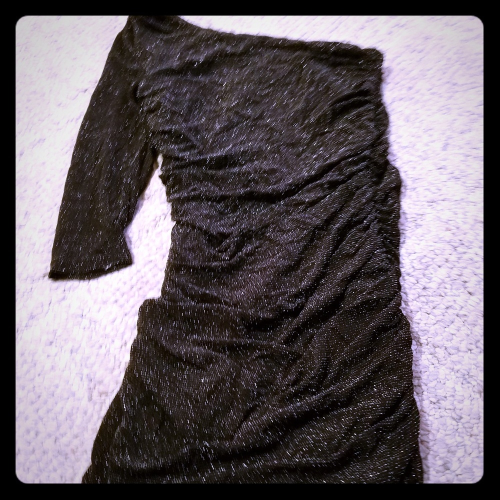 Tight sparkly black asymmetrical mini dress